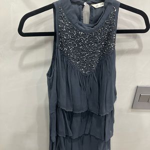 Dark charcoal gray Flowy sleeveless A-line style mini-dress. medium siz